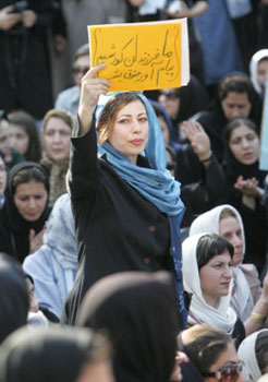 Iranian woman with sign