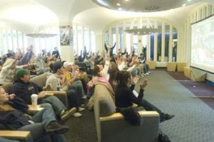 UAlbany students cheer on the Great Danes men's basketball team