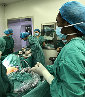 UAlbany's Caroline Apreku in the operating room in Nanjing