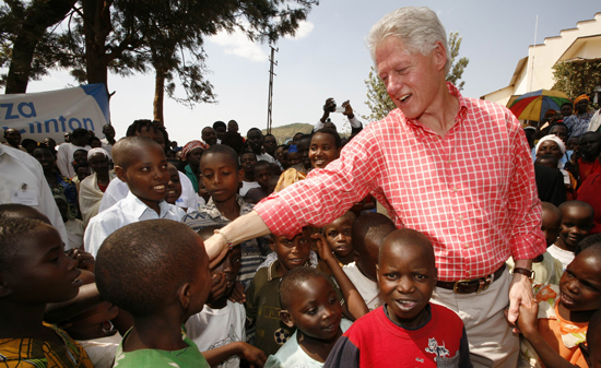 President Clinton greets Rwandan youth