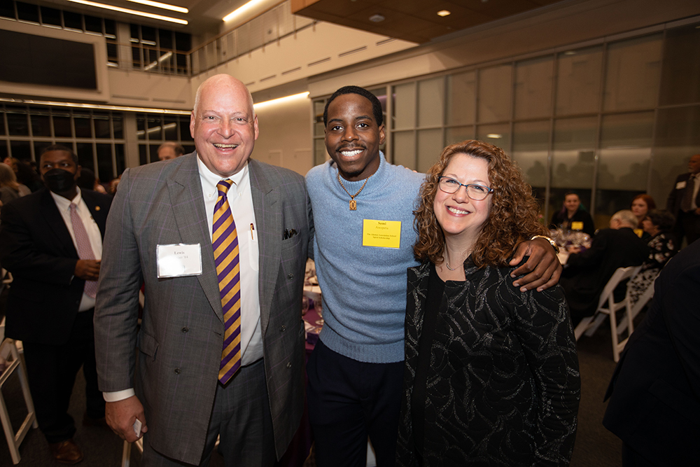 L to R: Lewis Weiner, Semi Awopetu (scholarship winner), Jill Delaney pose at the 2022 Celebration of Scholarships dinner