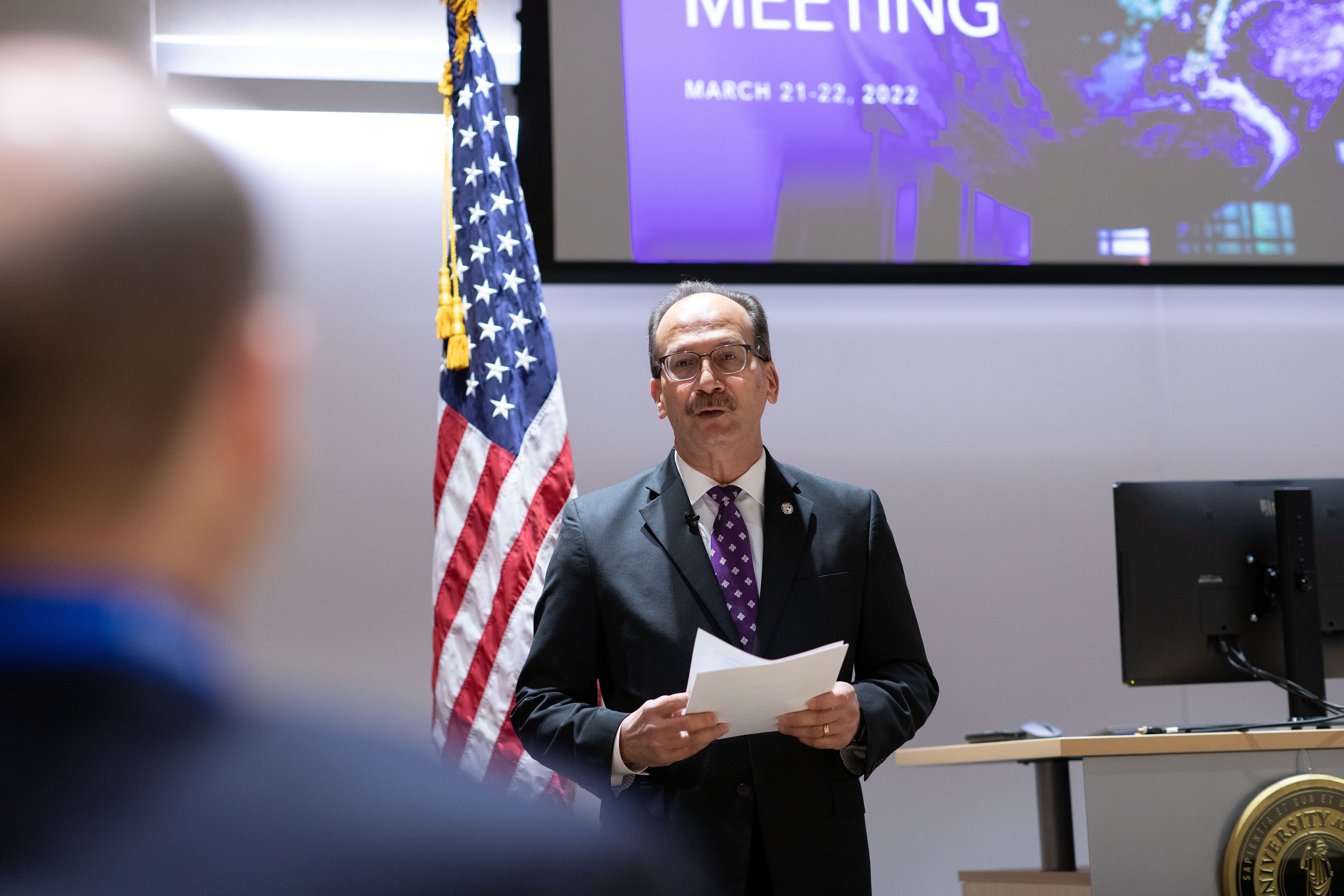 President Rodríguez speaks with attendees during a welcome at the WISER planning meeting on Monday..