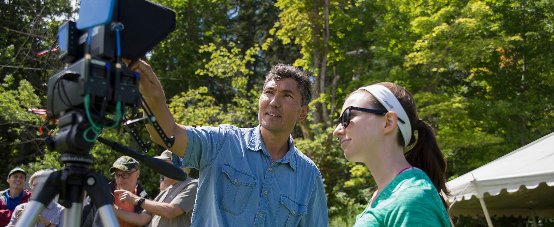 Assistant Professor Alexander Buyantuev and Graduate student Clare Gaffey working with Drones to document the tree canopies at the Huyck Preserve. Photo by Carlo de Jesus