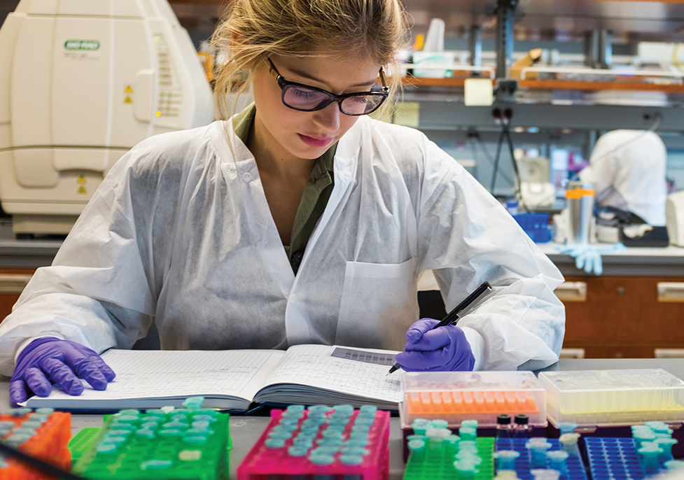 Student working in a biotech lab