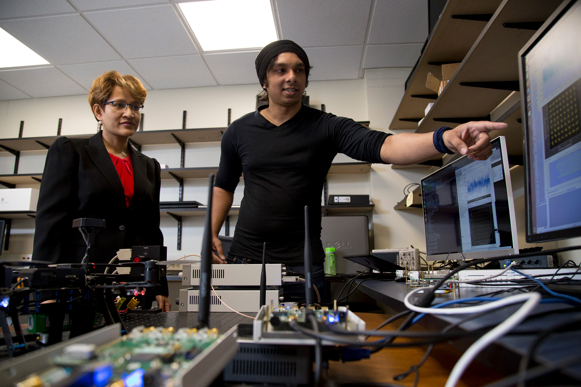 faculty and student in signal and processing communications lab 