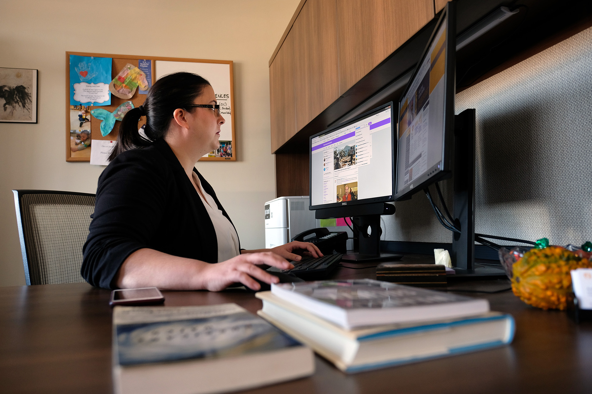 CEHC's Amber Silver monitors social media from her desk inside the Crisis Informatics Lab.