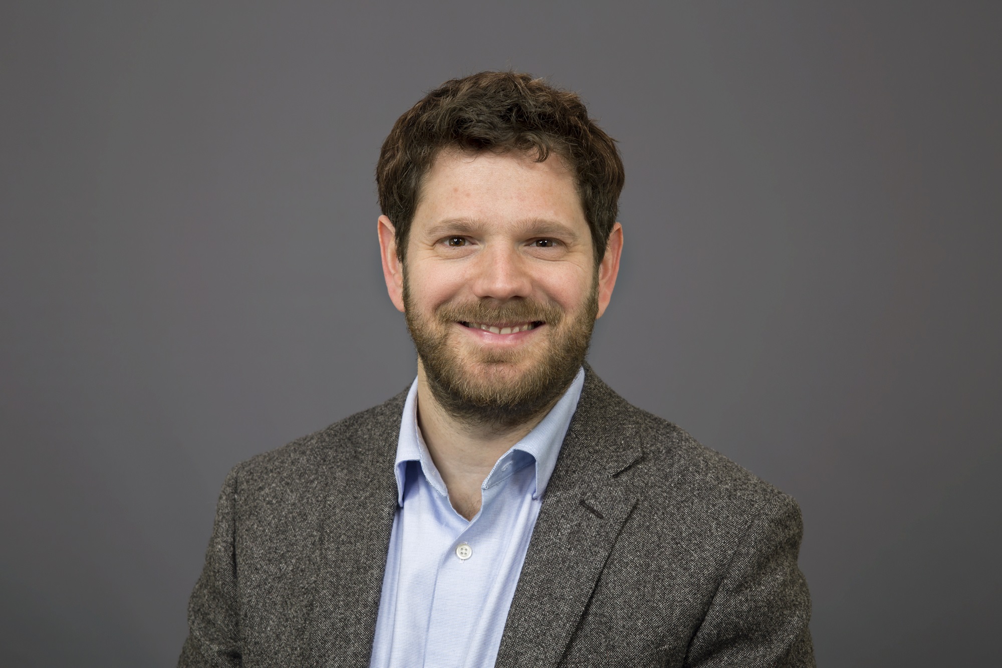 Headshot of Political Science Associate Professor Tim Weaver.