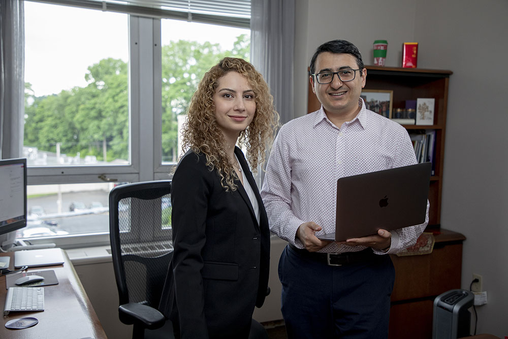 Shaghayegh Sahebi, left, and Reza Feyzi-Behnagh are using a new NSF grant to detect procrastination in online learners and find ways to improve these learners' self-regulation.