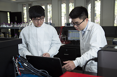Graduate student Lingqun Zeng (L.) and ESE Assistant Professor Rixiang Liu working in Hydrology and Water Quality Lab
