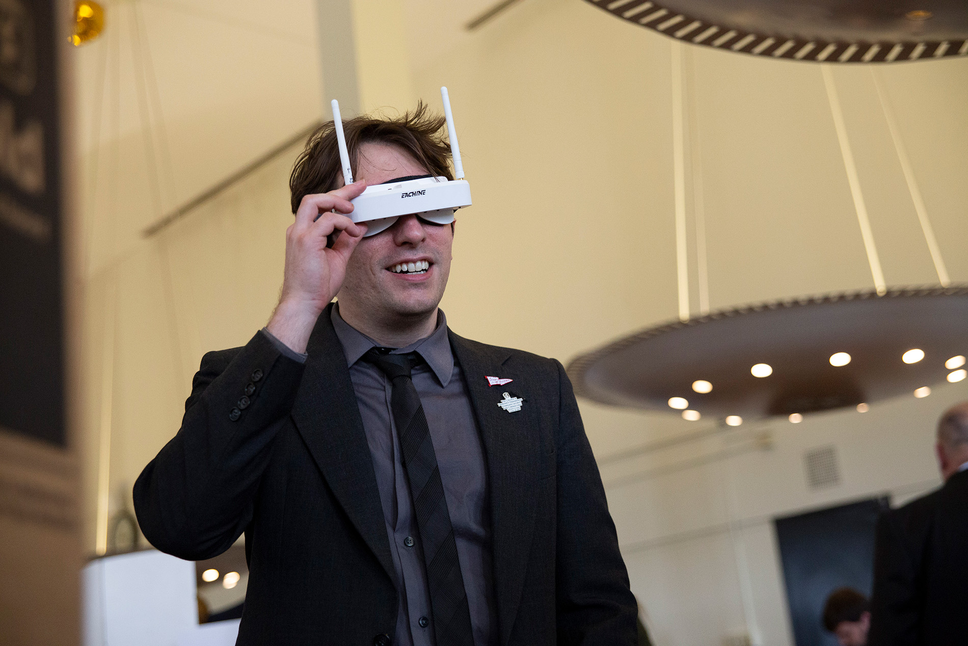 Student testing out project equipment at CEHC Showcase event