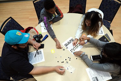 Students work together on a design challenge during UAlbany’s State of Grace conference.