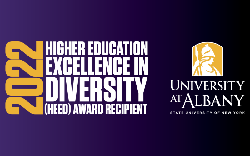 A purple slide with the the UAlbany Minerva logo that includes the text "2022 Higher Education Excellence in Diversity (HEED) award recipient."