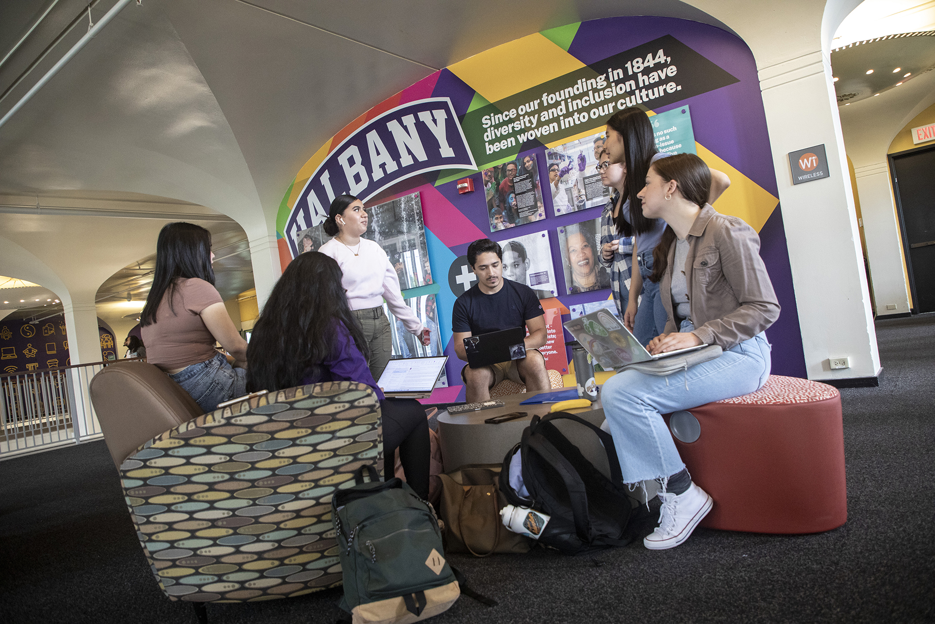 UAlbany students working together in campus center