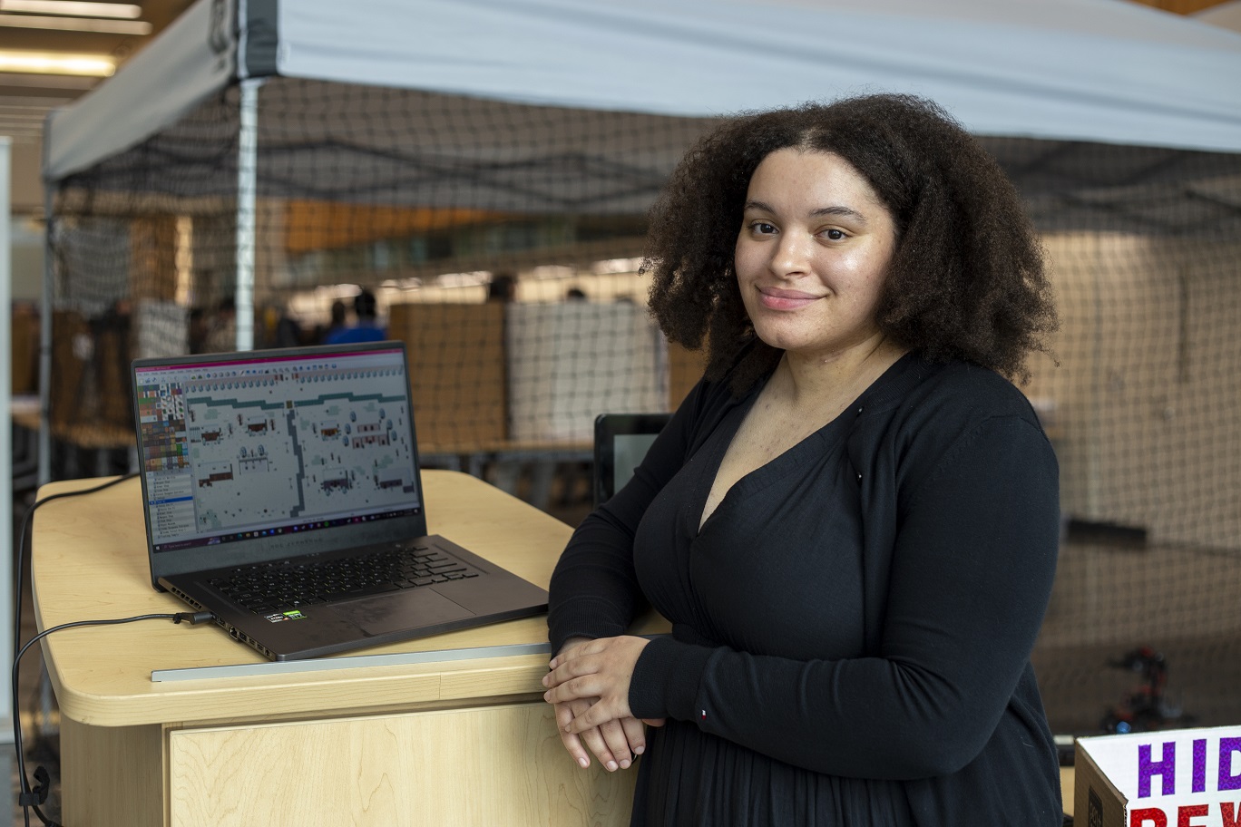 Noelle Capodieci shows off her role-playing game, Hidden Ridden Rival.