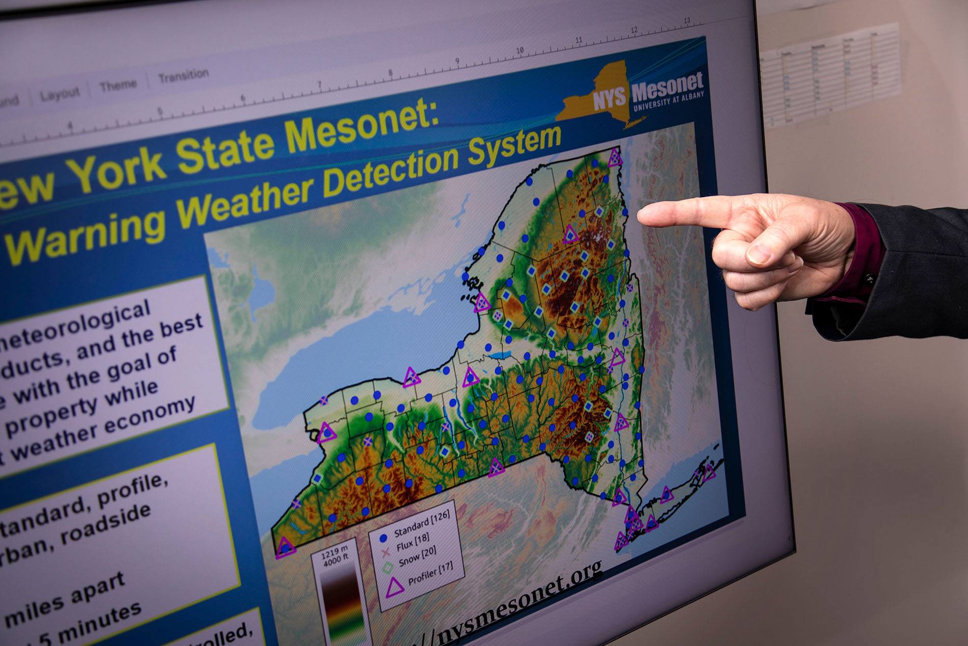 A finger points at a New York State Mesonet map.