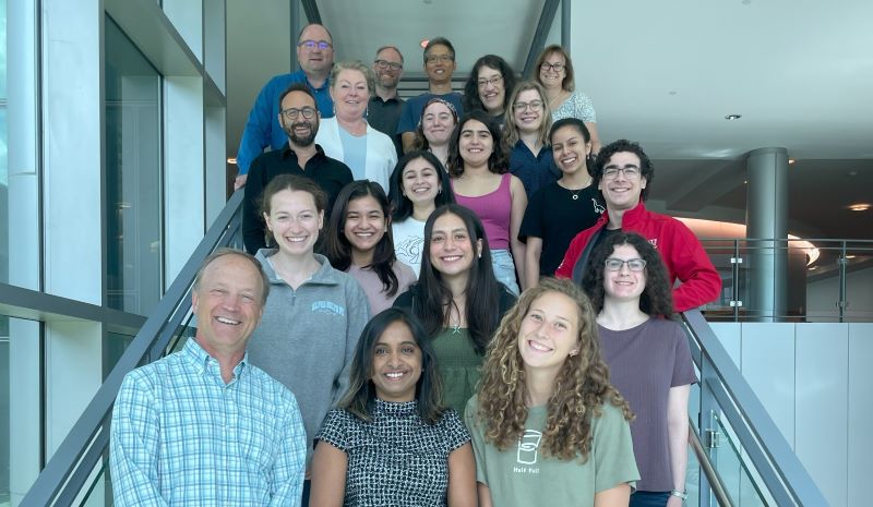 2024 REU in RNA Cohort group on stairs in the Life Sciences building.