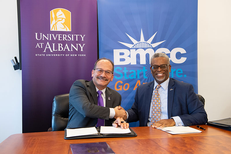 The Presidents of UAlbany and BMCC signing the dual admission agreement.