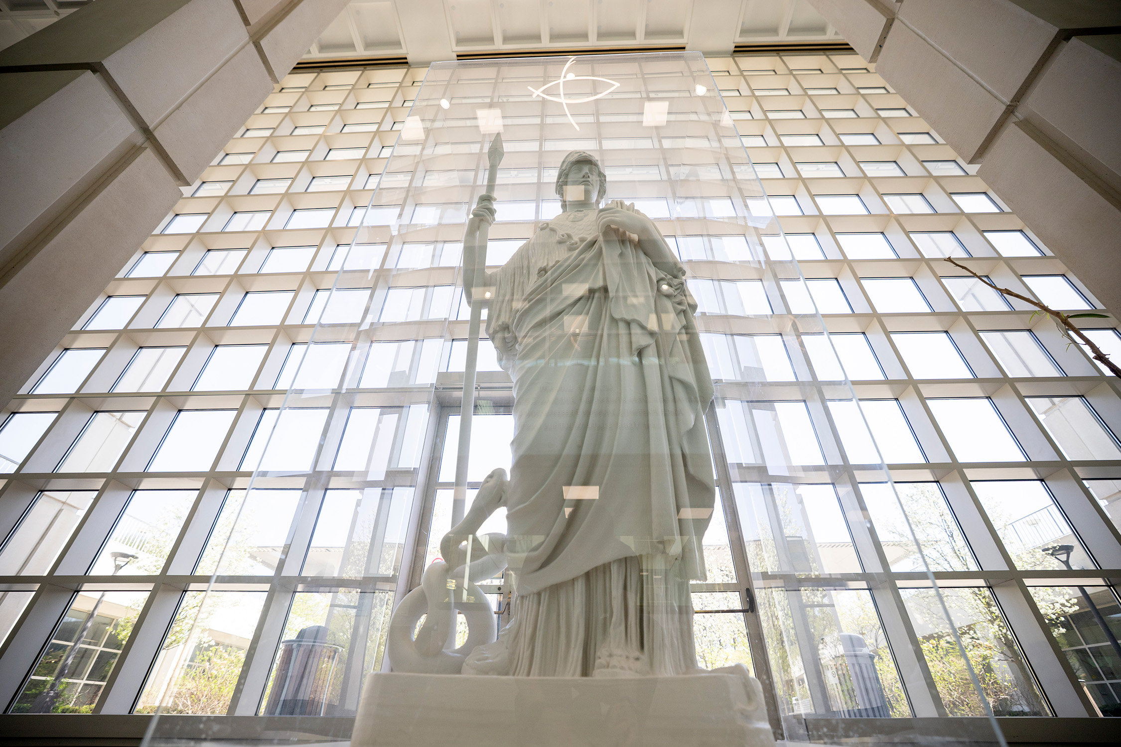 The statue of Minerva stands, looking ahead.