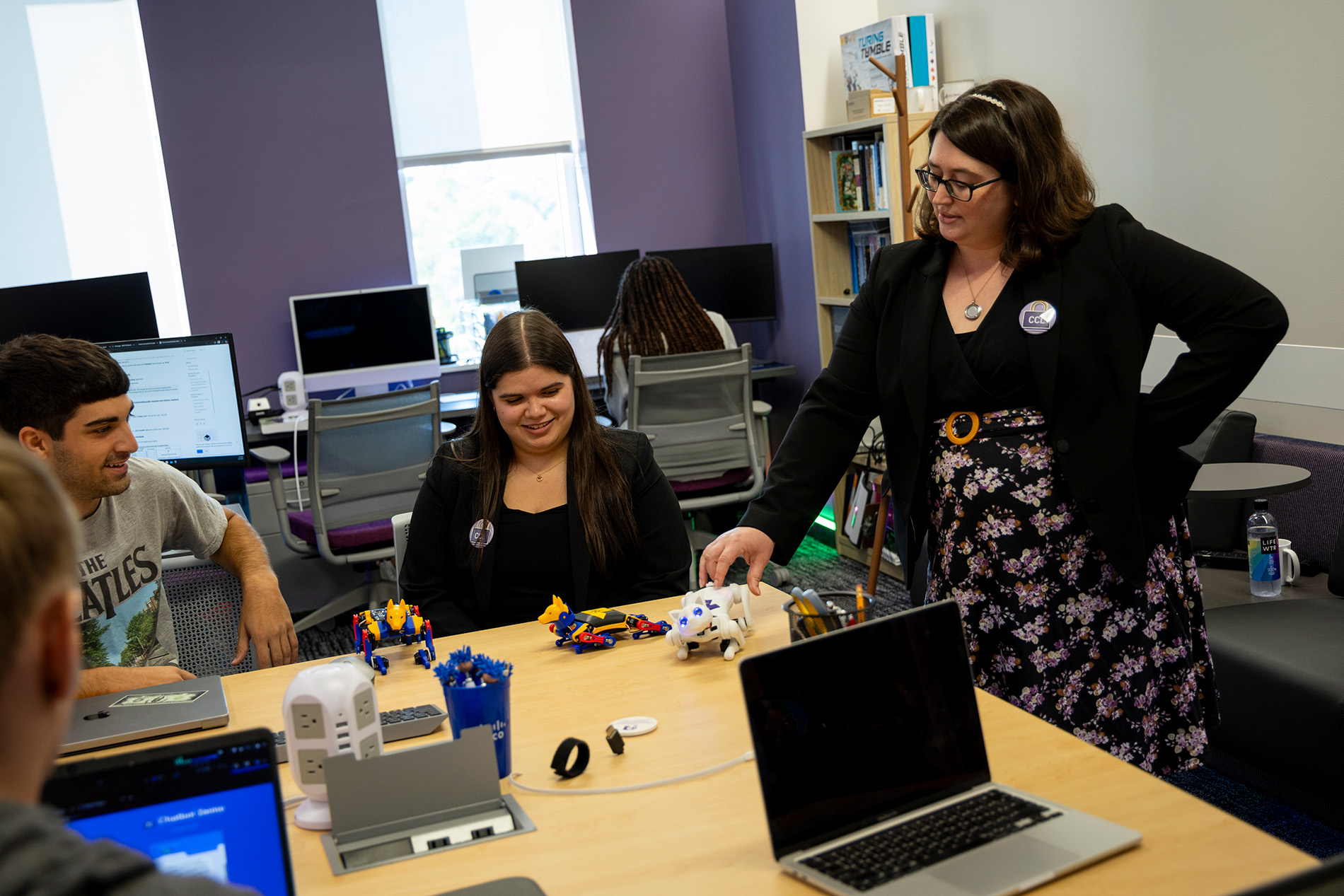 Professor Kimberly A. Cornell interacts with students in the Cybersecurity and Cryptography Lab.