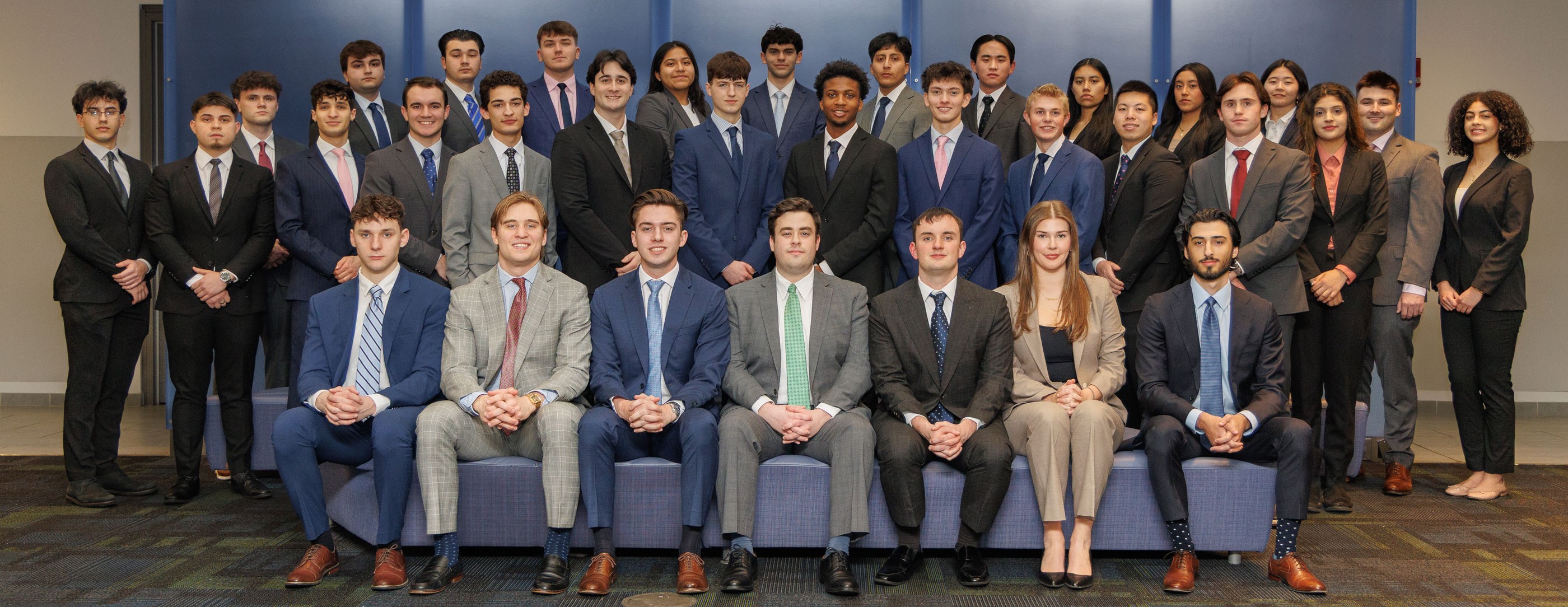 UASBIG Group students sitting and standing for a group photo.