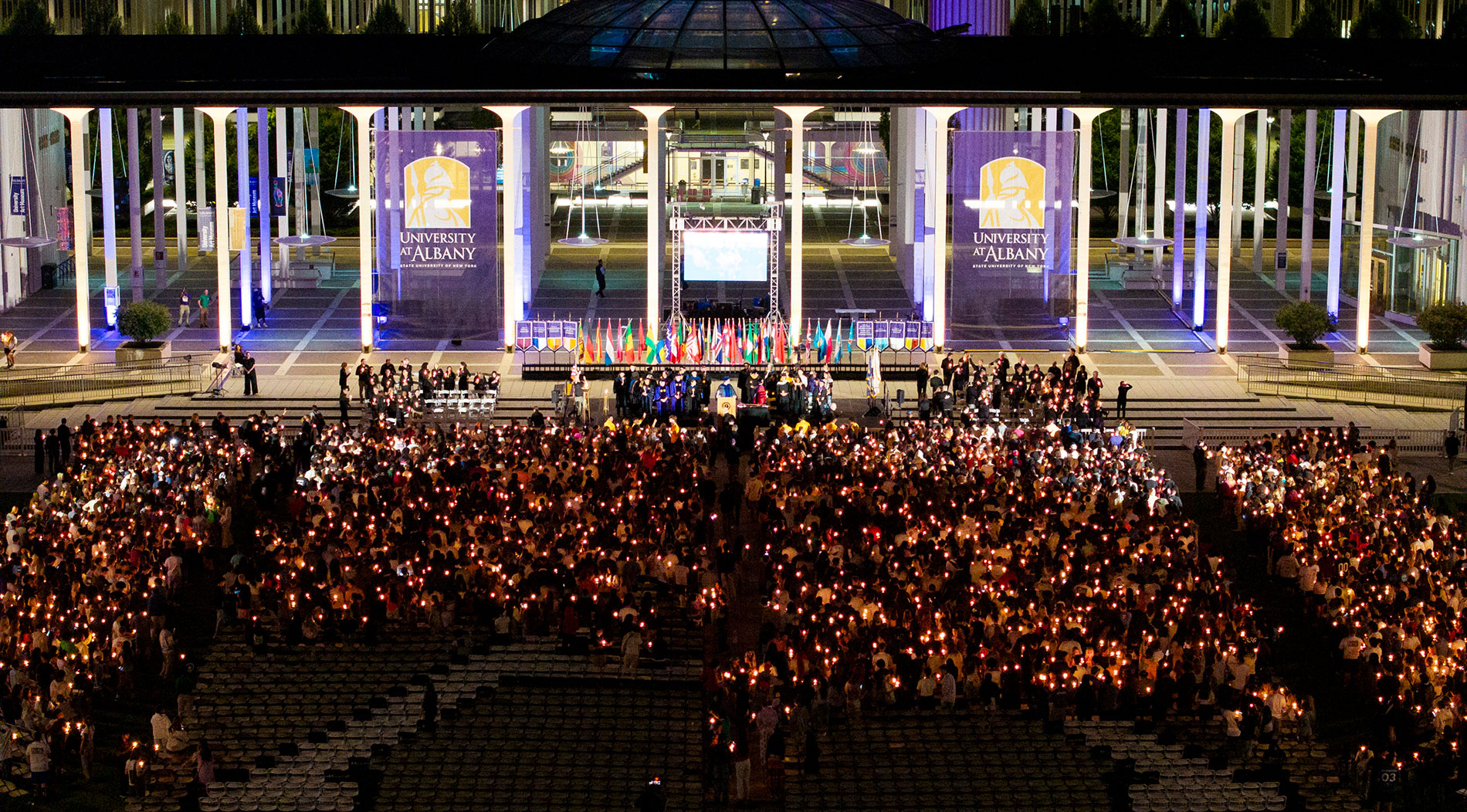 Students gathered in front of the entry way for candlighting.