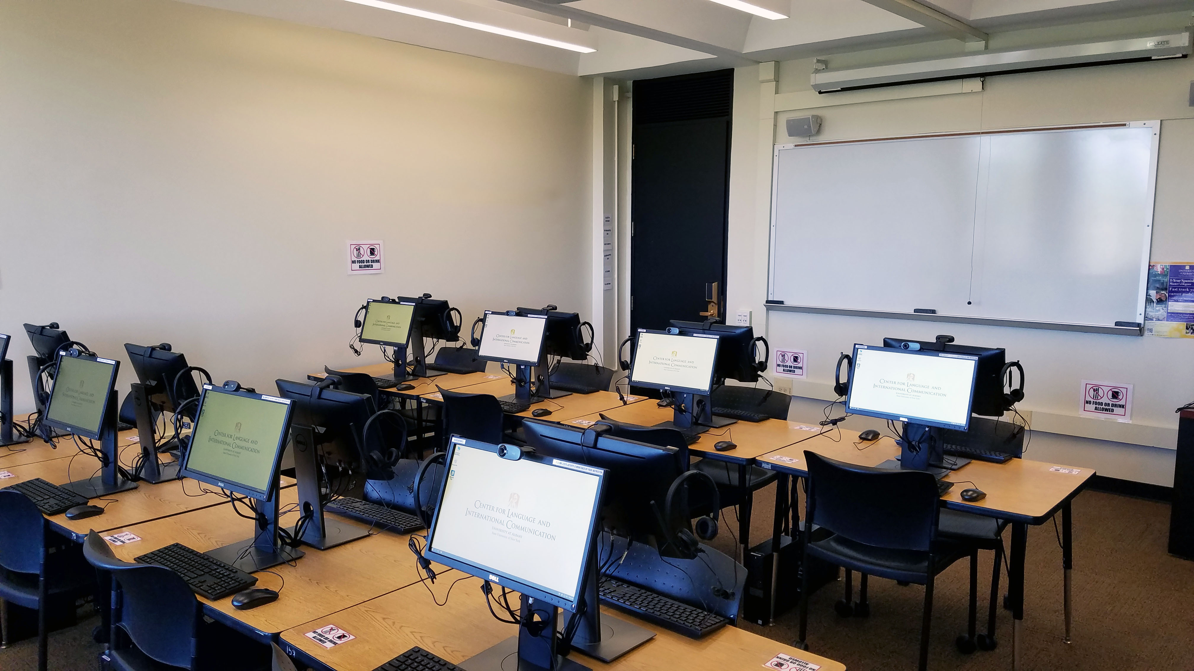 Language laboratory with computers turned on.