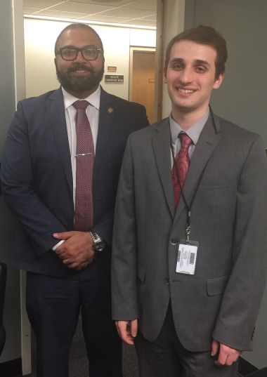 Honors College student Michael Allain, right, on the job with state Sen. Kevin Thomas of Long Island, who chairs the Committee on Consumer Protection. 