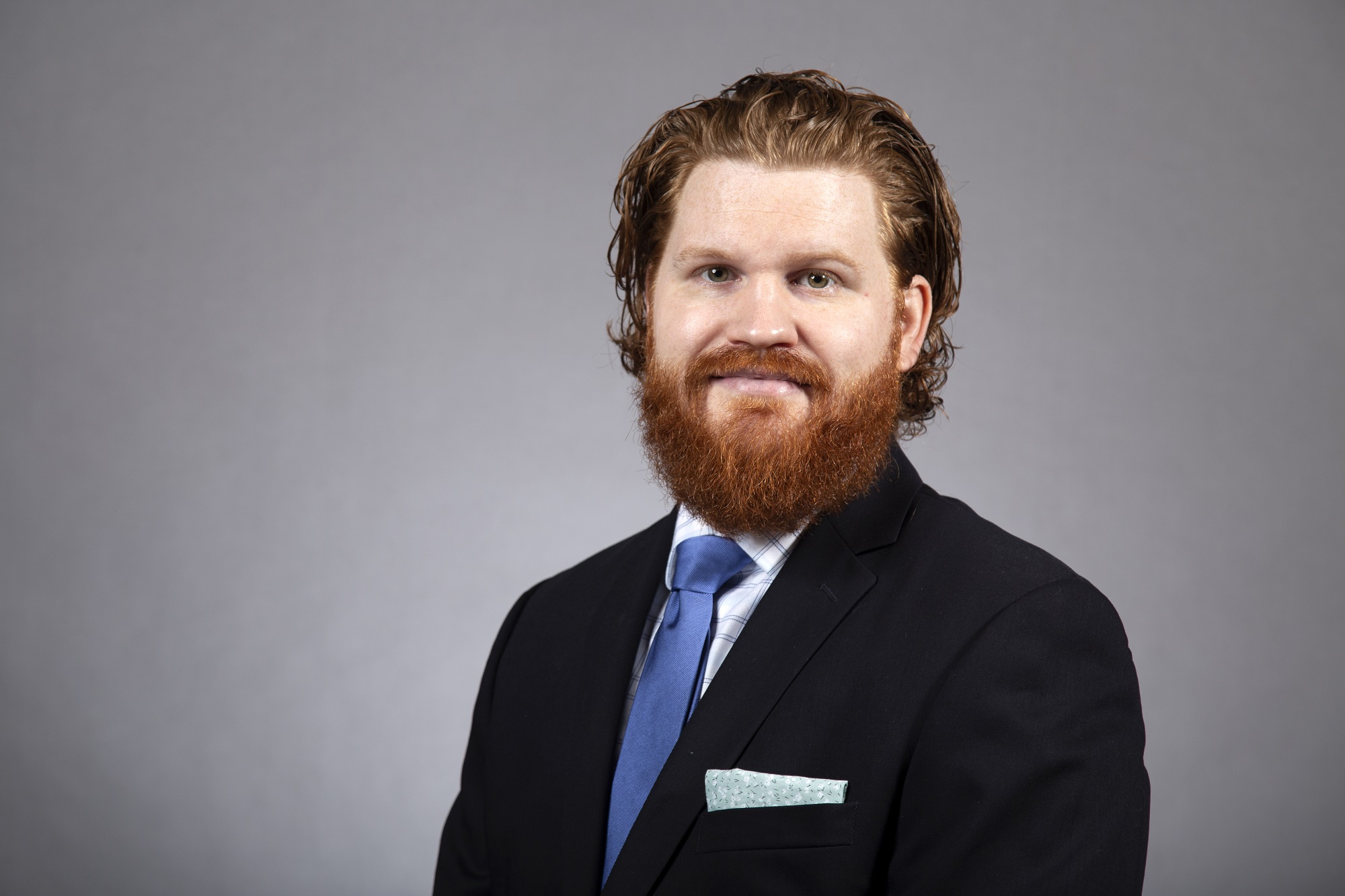 Headshot of Alex Greer, associate professor at CEHC.