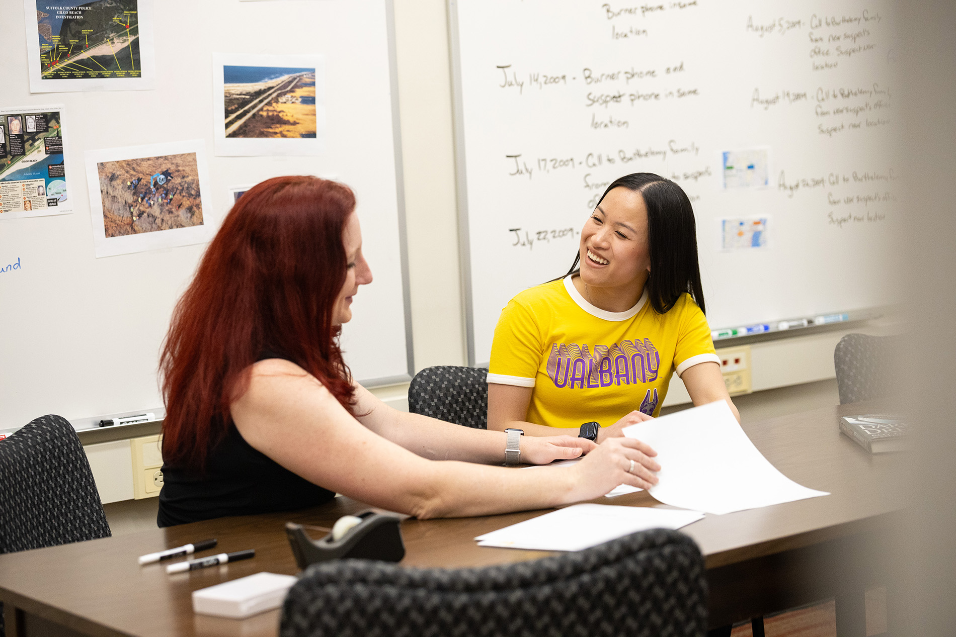 Camela Hughes works with a student 