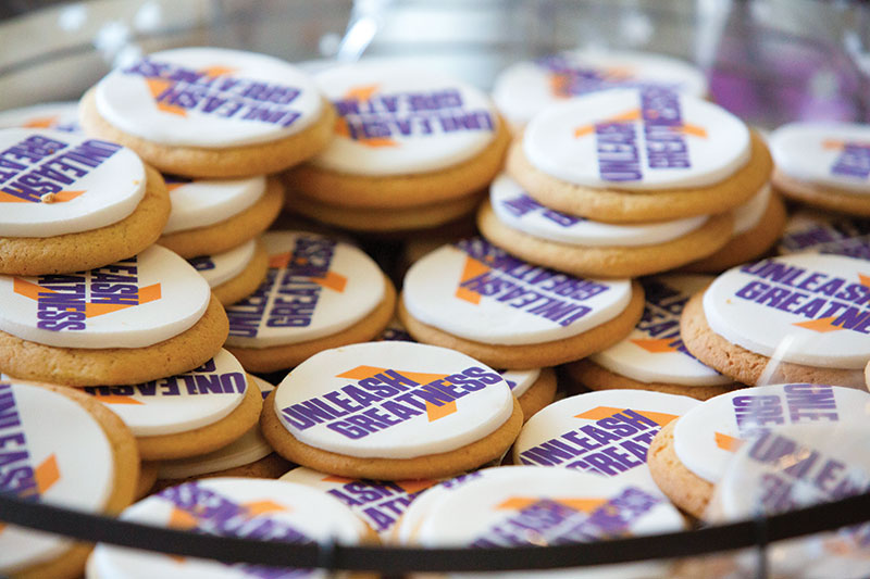 Cookies that say Unleash Greatness with the Chevron graphic