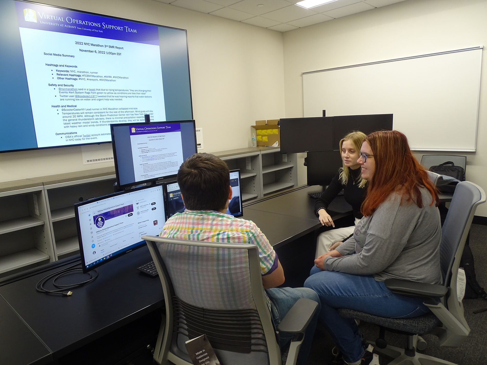 UAlbany VOST students gather for a debrief following the NYC Marathon.