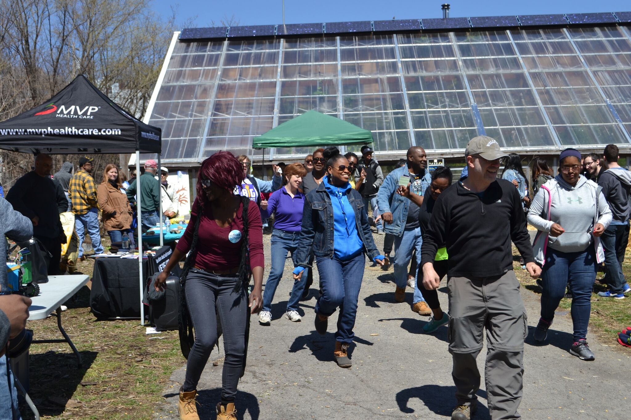 Debernee S. Privott, PhD, Assistant Dean for Public Engagement, College of Arts and Sciences (center), dancing in South End, Albany, NY