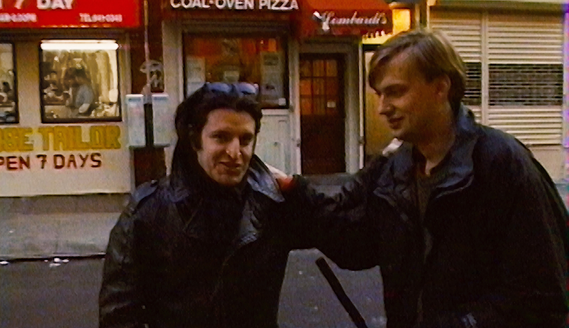 David Shapiro and Leeds Atkinson talk outside Lombardi's Pizzeria in downtown Manhattan.