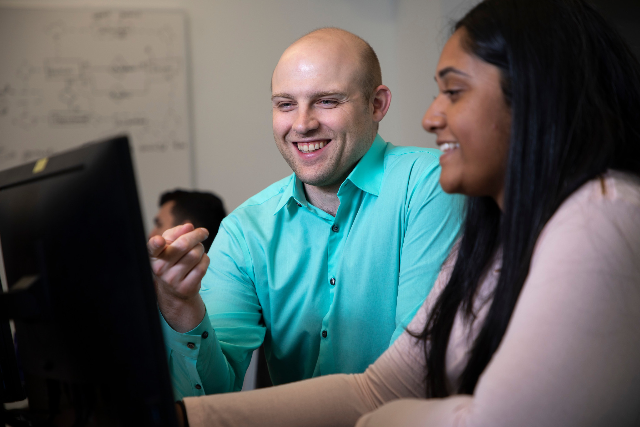 Faculty and student discussing Digital Forensics lab