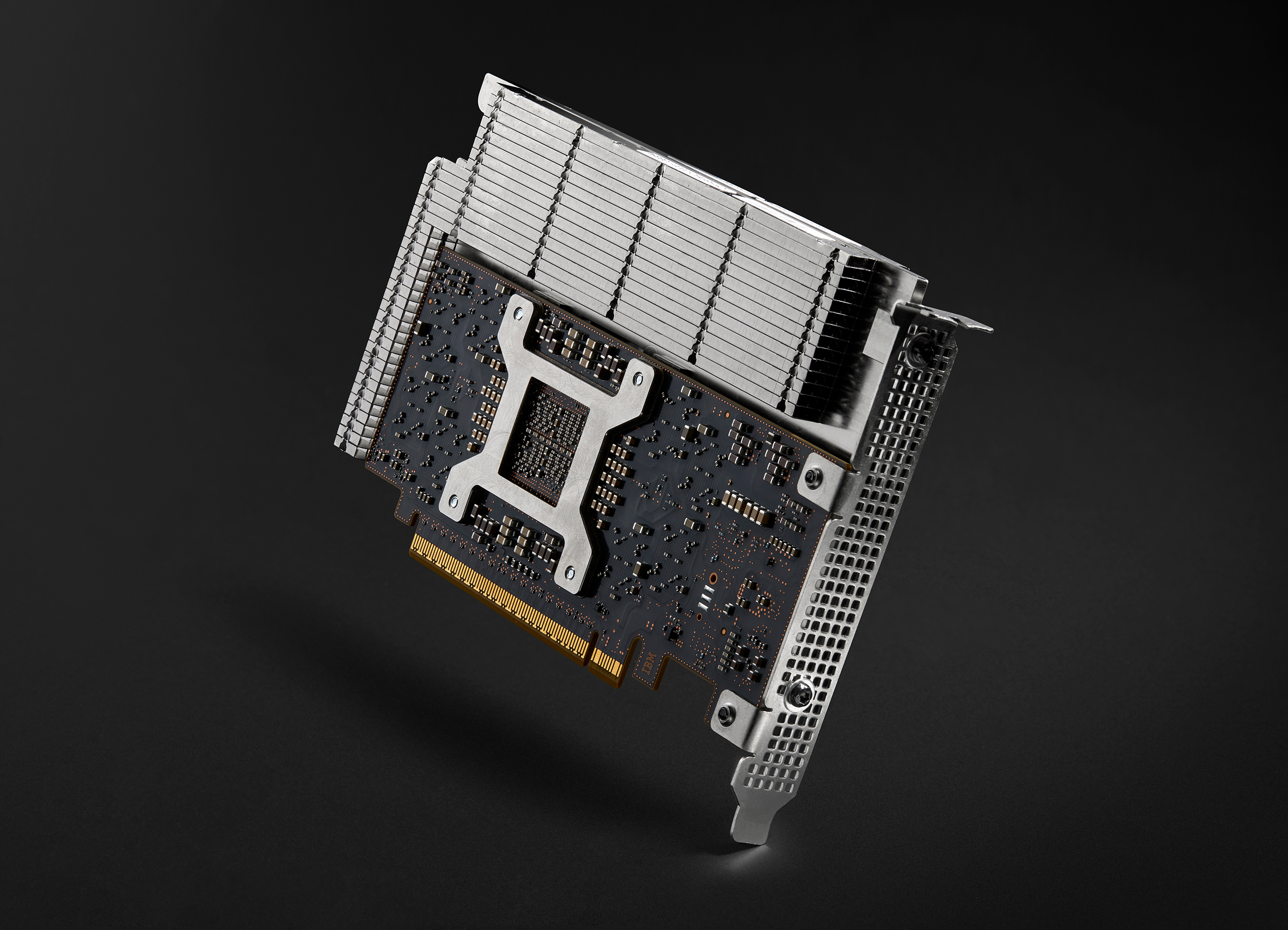 A close-up image of a silver and black PCIe computer card.