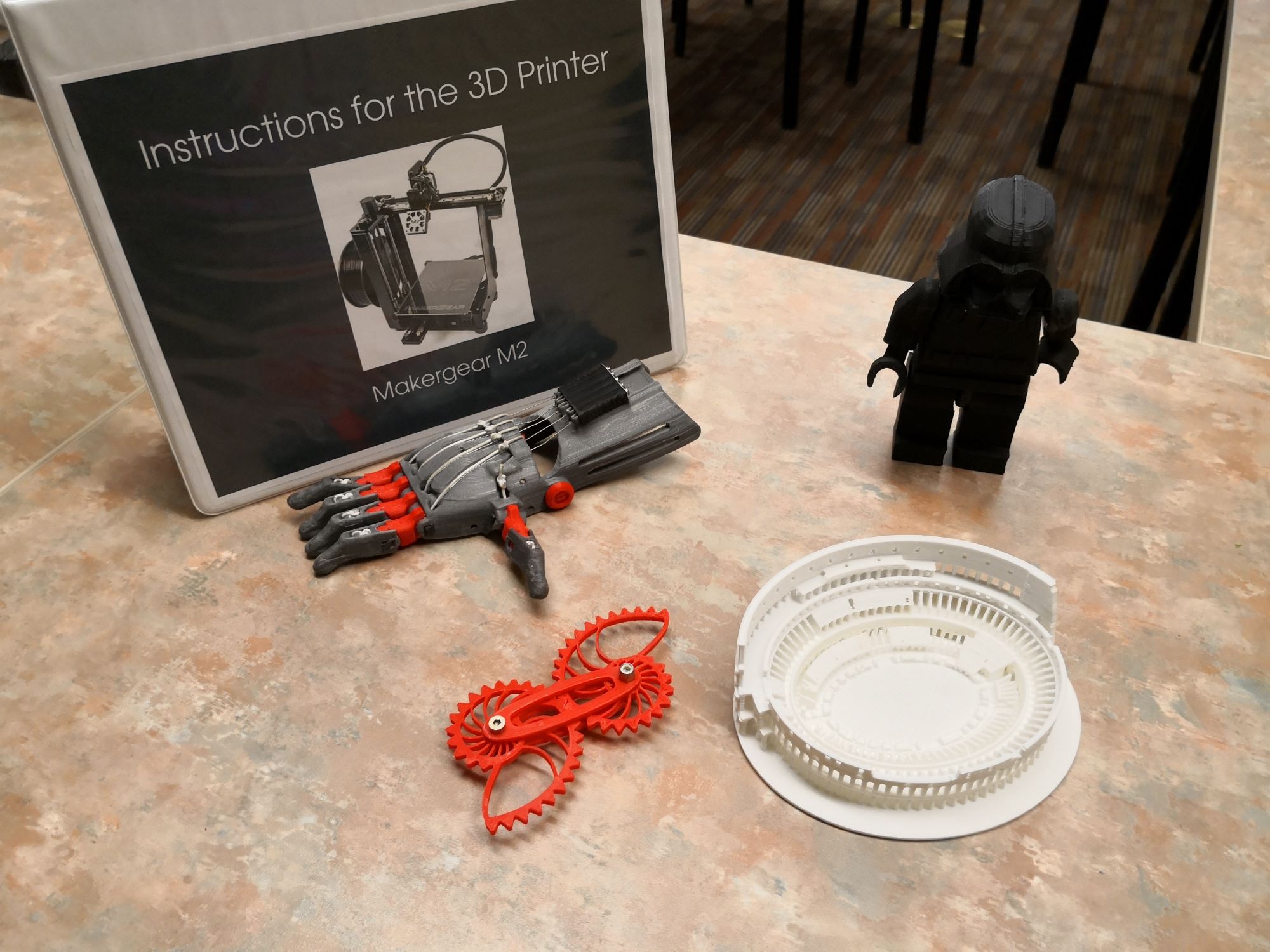 A table contains several 3D models along with instructions for a D3 printer.