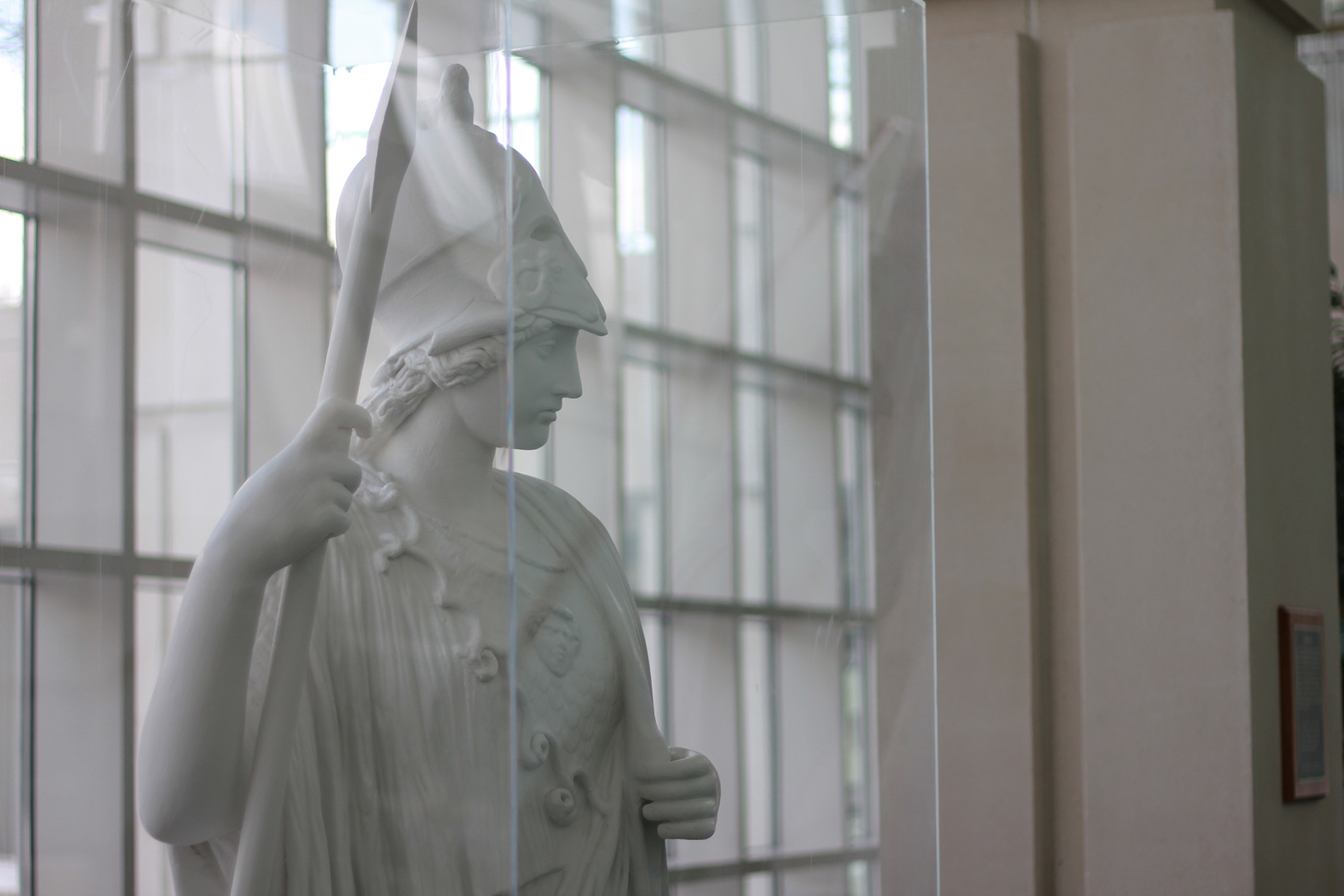 A white plaster statue of Minerva, the Roman goddess of wisdom