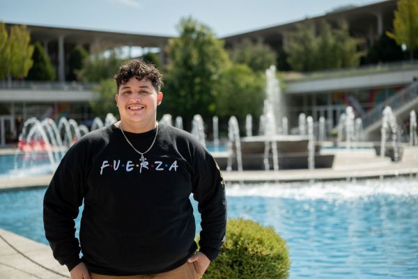 Juan Torres, in a black sweatchirt with the word FUERZA in white letters