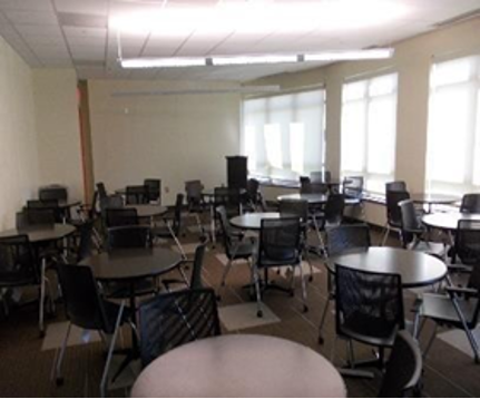 Liberty Terrace Community Area's Large Conference Room Room 116 with a round setup