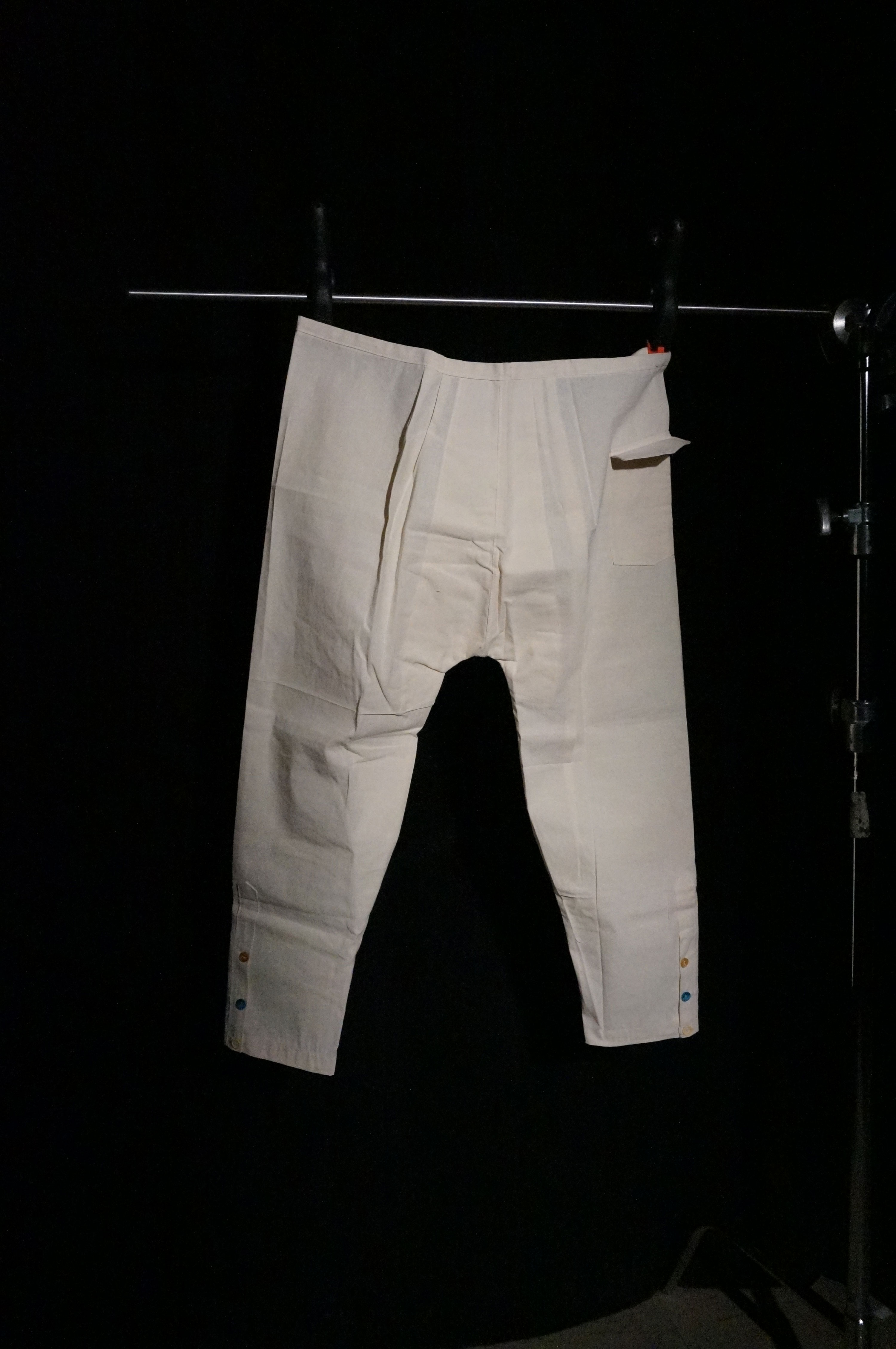 A man's white linen pants.