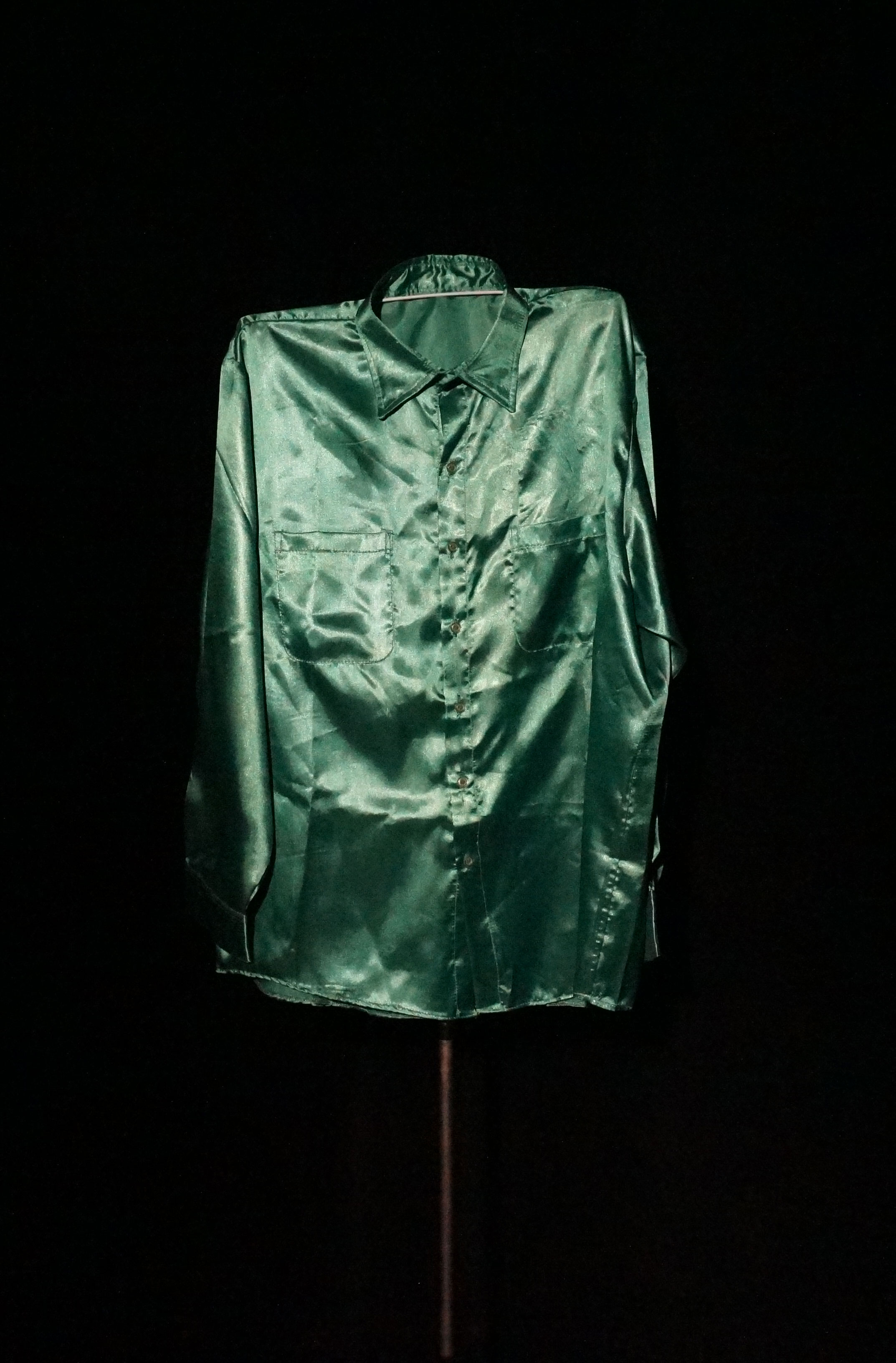 A man's green silk shirt.