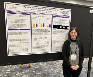 Melissa Anderson with her poster project at APS 2025.