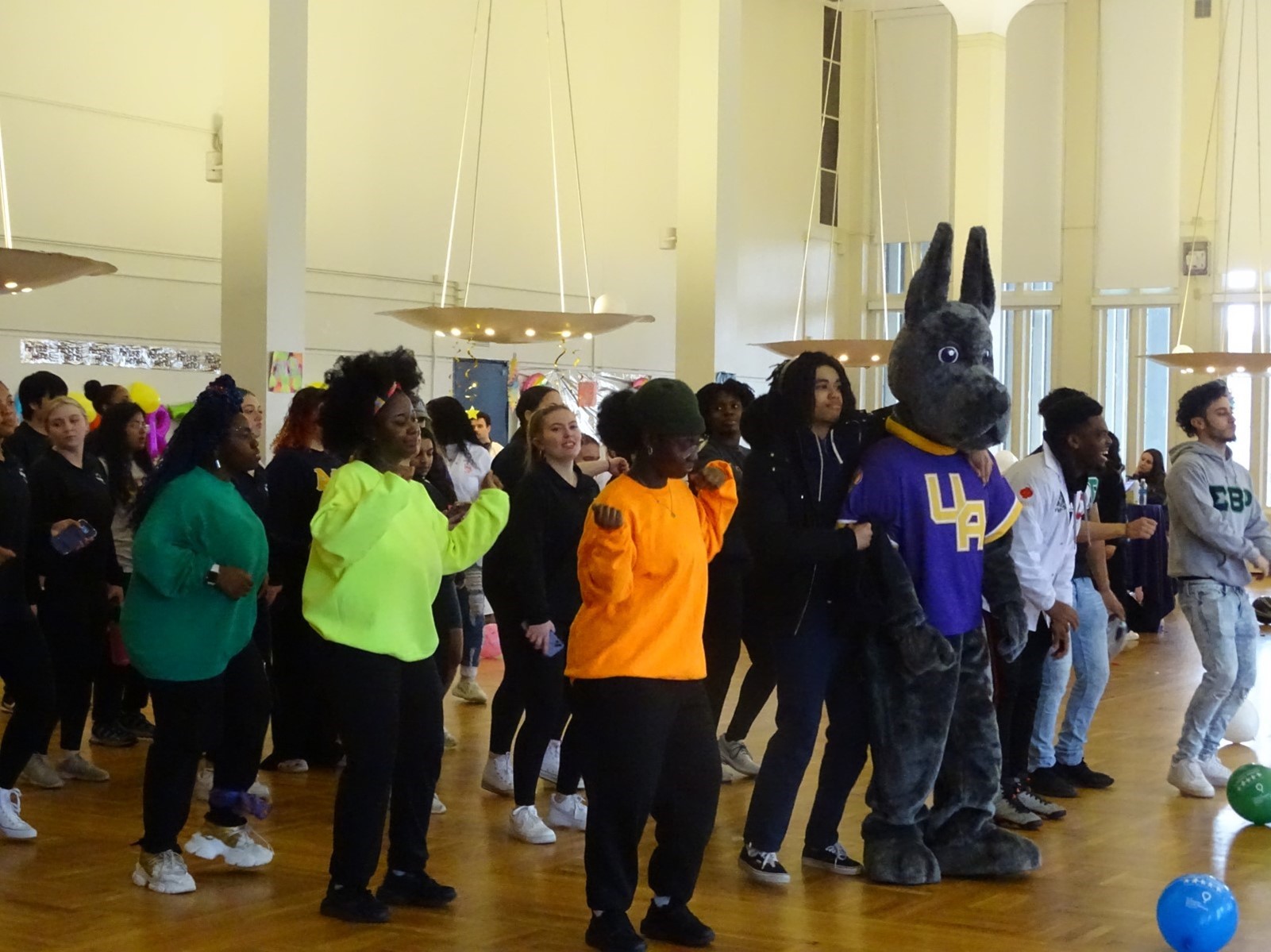 Damien dances with attendees at the Great Dane Dance Marathon.