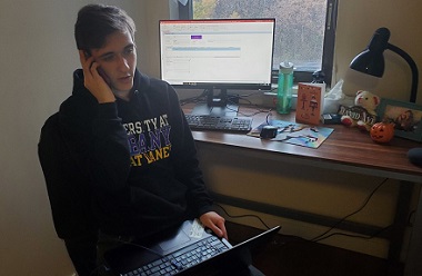 David Skorodinsky looks at the SST database while "on-call" during his volunteer hours.