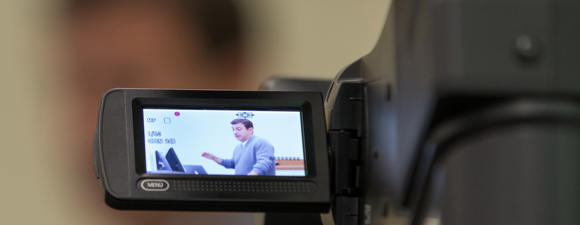 Communication alumnus Steve Greenstein, seen through camera viewfinder, talks about his career in video and film at an event sponsored by the Communication Department. Photographer: Paul Miller