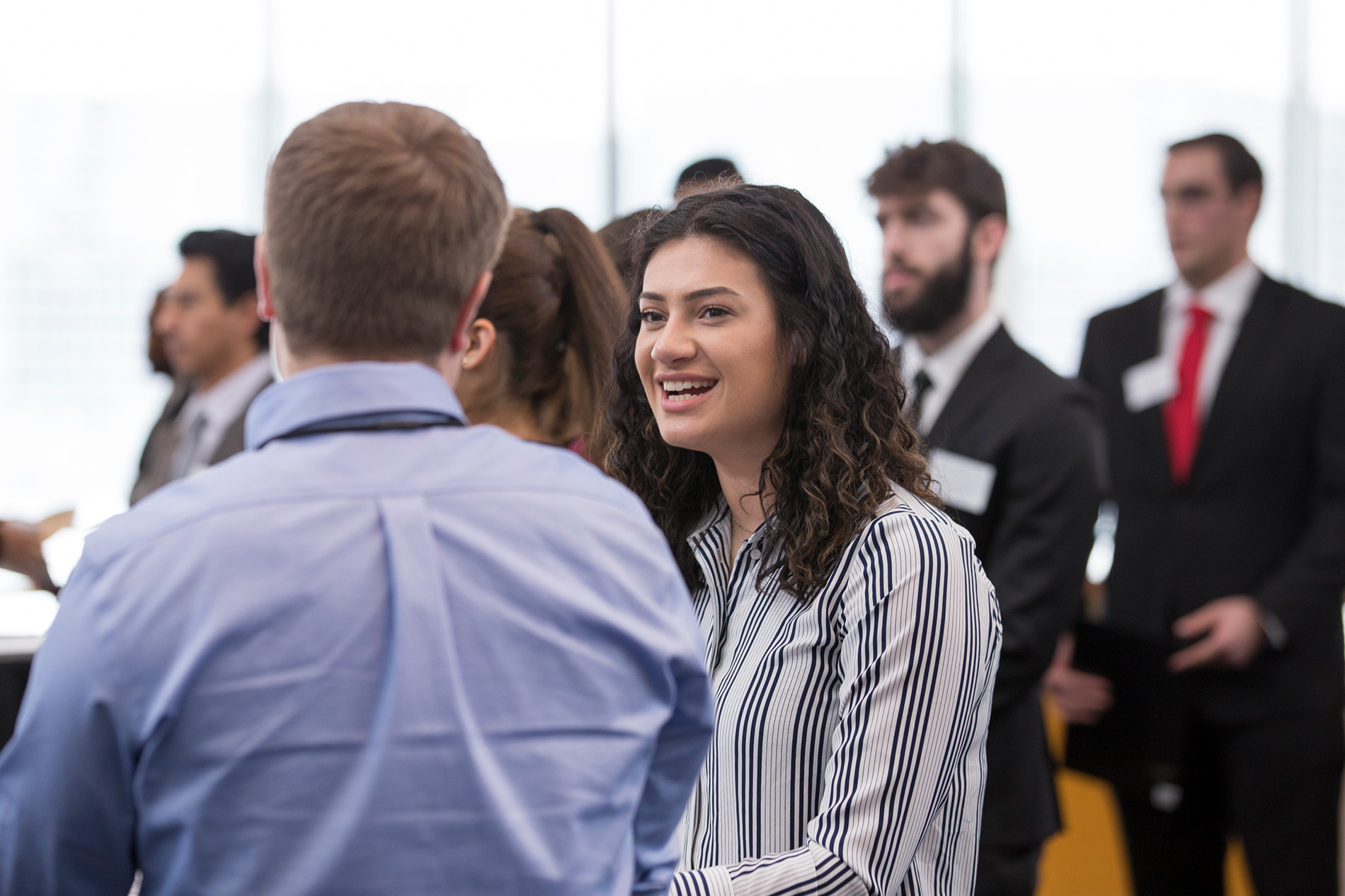 Students networking at cyber job fair 