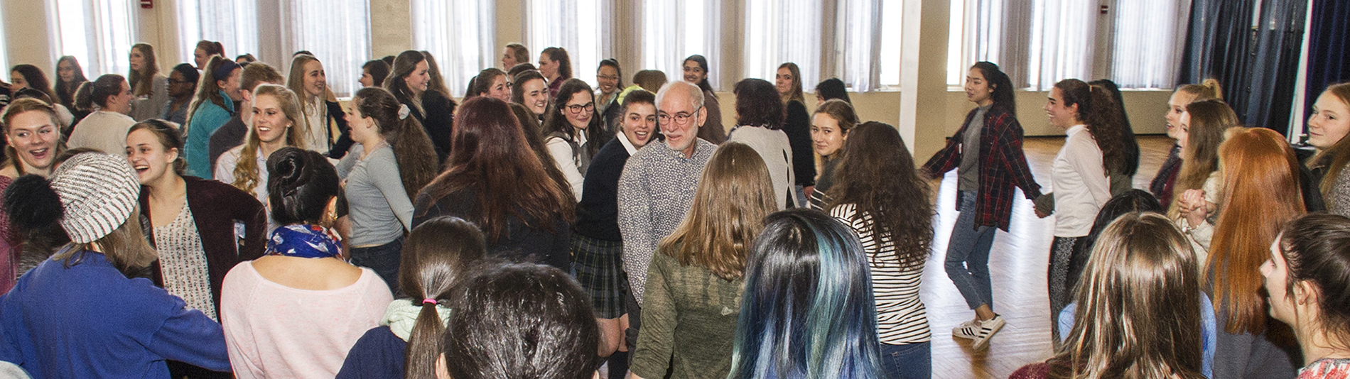 Area high school students studying the French language learn traditional French folk dance at the 2017 Francophone Day celebration in the Campus Center Ballroom. Photo: Mark Schmidt