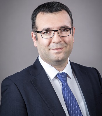 Headshot of Unal Tatar, assistant professor at the College of Emergency Preparedness, Homeland Security and Cybersecurity.