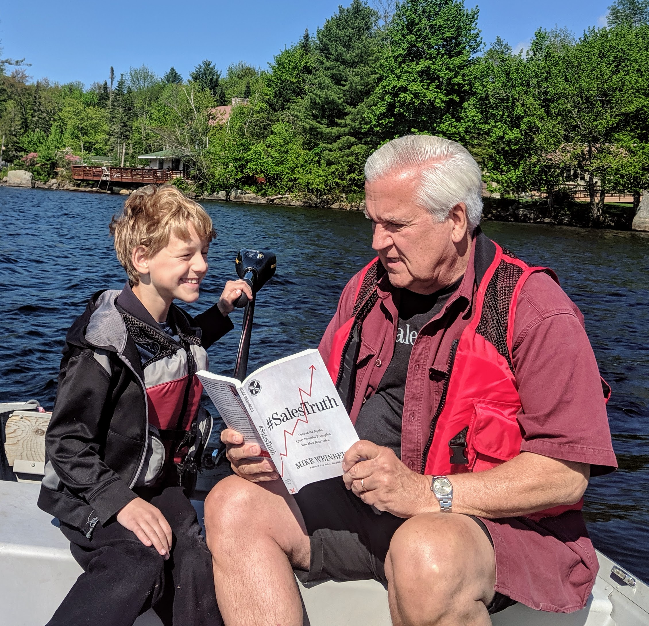 ​ UAlbany Professor Emeritus Bill Danko reads book to grandson ​ Danko reads Mike Weinberg's book to his grandson. ​ [Click and drag to move] 
