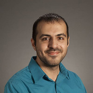 A portrait photo of UAlbany Assistant Professor Mustafa Aksoy.